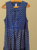 LaFleur is a loose-fitting dress in our beloved Shweshwe