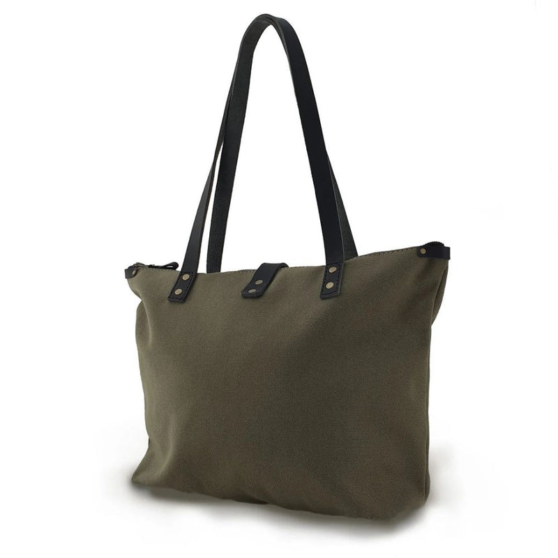 Hand cut and handcrafted using strong, durable 100% cotton canvas, coated with a natural beeswax making it water resistant. 
