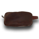 The Dopp Kit is a timeless classic leather toiletry bag. Travel and keep your toiletries protected and organized in style.
