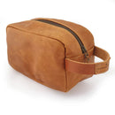 The Dopp Kit is a timeless classic leather toiletry bag. Travel and keep your toiletries protected and organized in style.