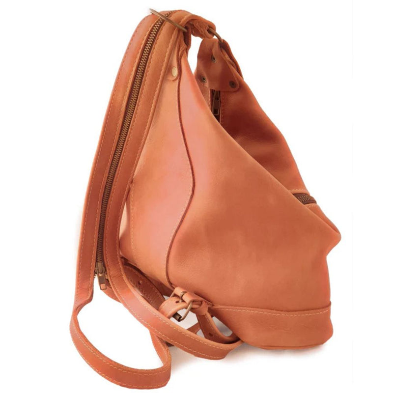 With a slightly bohemian allure, The Evelyn Bag easily adapts from shoulder bag to backpack with one quick zip!