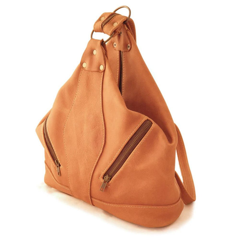 With a slightly bohemian allure, The Evelyn Bag easily adapts from shoulder bag to backpack with one quick zip!