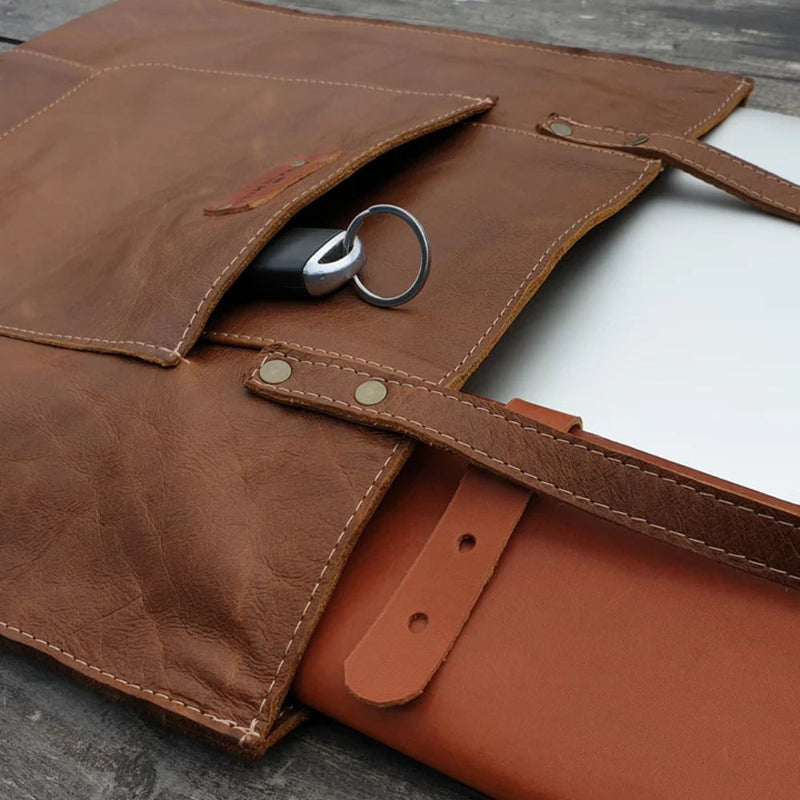 Perfect for your everyday essentials. You can even drop in your laptop. 