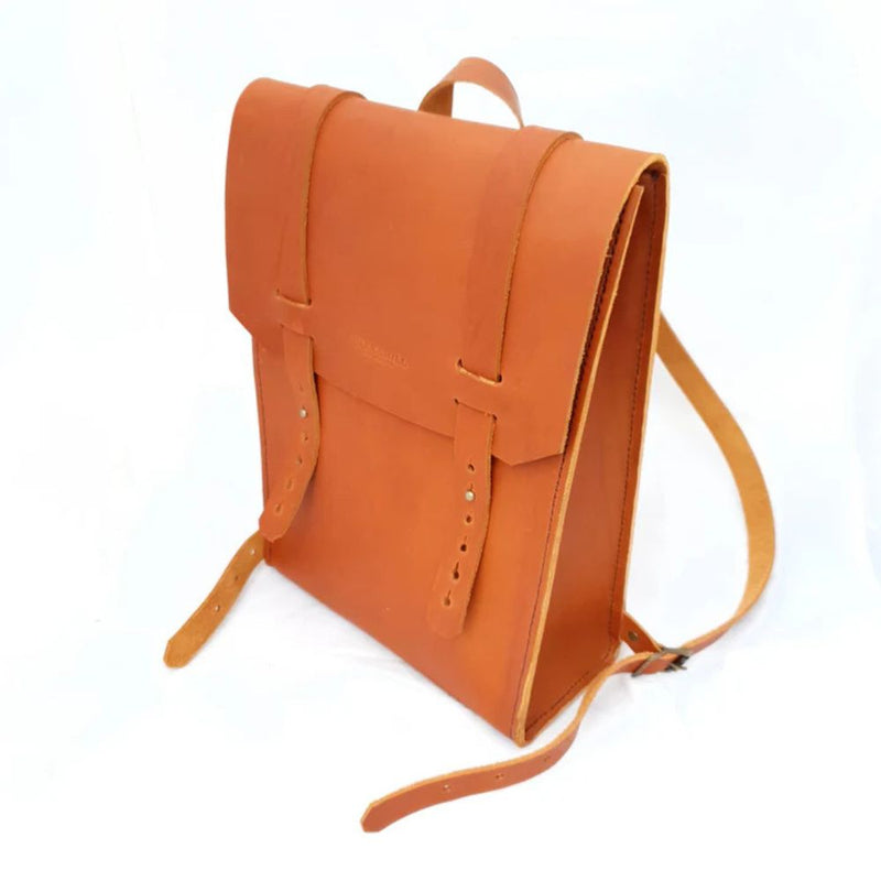 This is for you, the traveler, the explorer, the workhorse . The Houck backpack is constructed with 2.2mm-3mm Drum-dyed vegetable tanned leather, held together by waxed cotton and solid brass hardware .