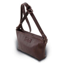 This handy little sling bag is perfect for a night out or for the minimalist lifestyle.