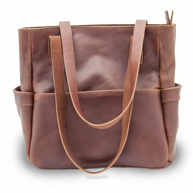 The Penelope will become your everyday handbag. Made from beautiful premium full grain leather and antique brass YKK zippers and hardware.  