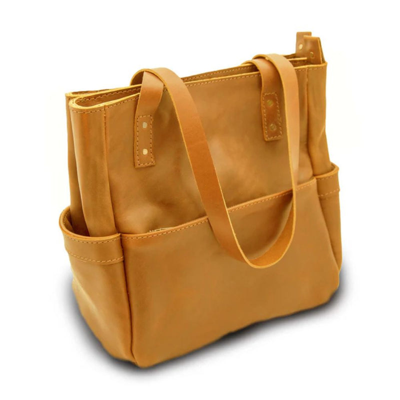 The Penelope will become your everyday handbag. Made from beautiful premium full grain leather and antique brass YKK zippers and hardware.  