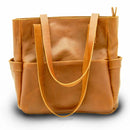 The Penelope will become your everyday handbag. Made from beautiful premium full grain leather and antique brass YKK zippers and hardware.  