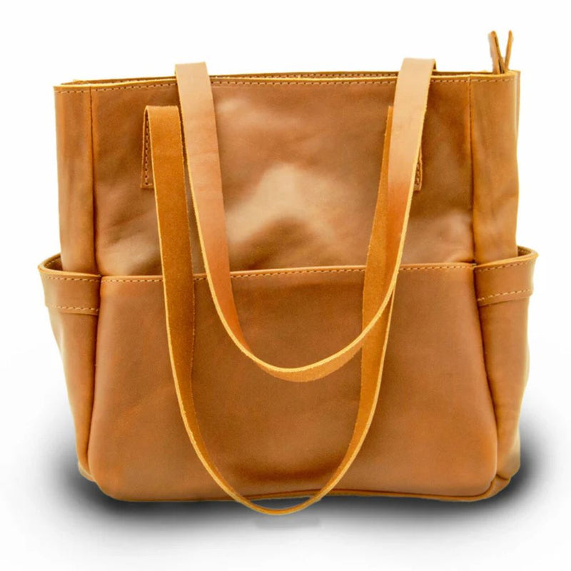 The Penelope will become your everyday handbag. Made from beautiful premium full grain leather and antique brass YKK zippers and hardware.  