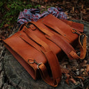 This classic design is simply one of our favorites. Hand crafted in our leather and canvas workshop with 3.5mm thick vegetable tanned leather and antique brass hardware.