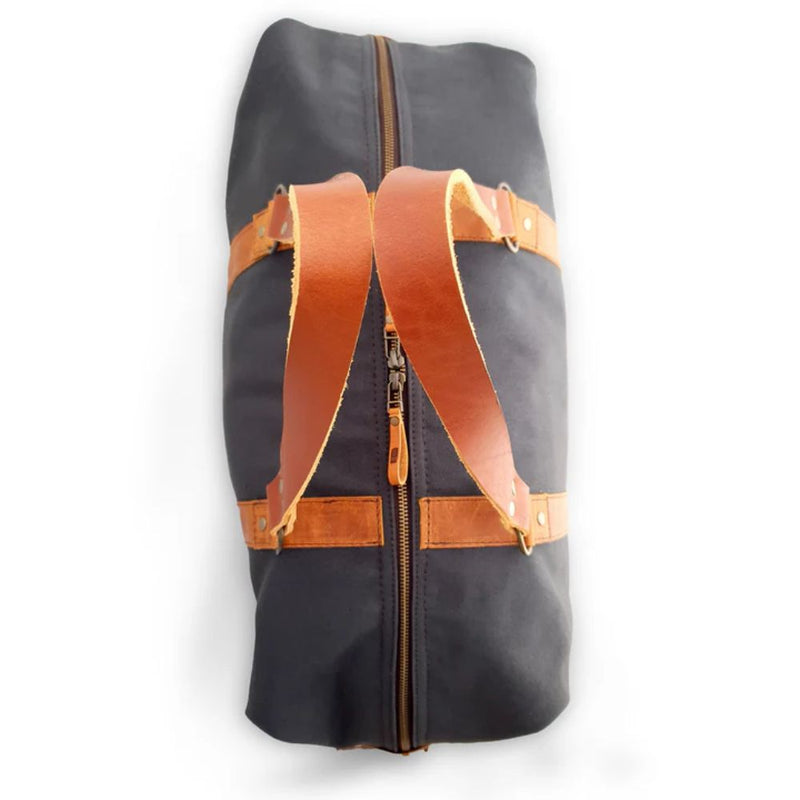  Our Canvas and Leather Travel Bag is an essential bit of luggage. A rugged, yet detailed and sophisticated design, the Travel Bag is the perfect bag for weekend getaways, work trips or overseas holidays when you need an additional suitcase.