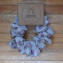 Handmade with care, our scrunchies offer a secure hold without pulling or tangling. Each measures around 20mm high and 100mm wide, with slight variations due to our unique, no-waste fabrics.
Soft elastic inside ensures comfort whether worn in your hair or on your wrist. Sustainable, stylish, and one of a kind—just like you