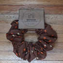 Handmade with care, our scrunchies offer a secure hold without pulling or tangling. Each measures around 20mm high and 100mm wide, with slight variations due to our unique, no-waste fabrics.
Soft elastic inside ensures comfort whether worn in your hair or on your wrist. Sustainable, stylish, and one of a kind—just like you
