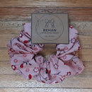 Handmade with care, our scrunchies offer a secure hold without pulling or tangling. Each measures around 20mm high and 100mm wide, with slight variations due to our unique, no-waste fabrics.
Soft elastic inside ensures comfort whether worn in your hair or on your wrist. Sustainable, stylish, and one of a kind—just like you