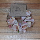 Handmade with care, our scrunchies offer a secure hold without pulling or tangling. Each measures around 20mm high and 100mm wide, with slight variations due to our unique, no-waste fabrics.
Soft elastic inside ensures comfort whether worn in your hair or on your wrist. Sustainable, stylish, and one of a kind—just like you