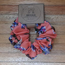 Handmade with care, our scrunchies offer a secure hold without pulling or tangling. Each measures around 20mm high and 100mm wide, with slight variations due to our unique, no-waste fabrics.
Soft elastic inside ensures comfort whether worn in your hair or on your wrist. Sustainable, stylish, and one of a kind—just like you