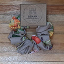 Handmade with care, our scrunchies offer a secure hold without pulling or tangling. Each measures around 20mm high and 100mm wide, with slight variations due to our unique, no-waste fabrics.
Soft elastic inside ensures comfort whether worn in your hair or on your wrist. Sustainable, stylish, and one of a kind—just like you