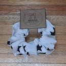 Handmade with care, our scrunchies offer a secure hold without pulling or tangling. Each measures around 20mm high and 100mm wide, with slight variations due to our unique, no-waste fabrics.
Soft elastic inside ensures comfort whether worn in your hair or on your wrist. Sustainable, stylish, and one of a kind—just like you