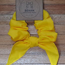 Handmade with care, this medium scrunchie features a soft elastic core and a short tie-on for a subtle, stylish finish. Measuring around 20mm high and 100mm wide, it offers a secure hold without tugging or tangling.
Made from new as well as repurposed fabrics, each one is unique in texture and appearance—true to our no-waste values. Perfect for daily wear in your hair or on your wrist.