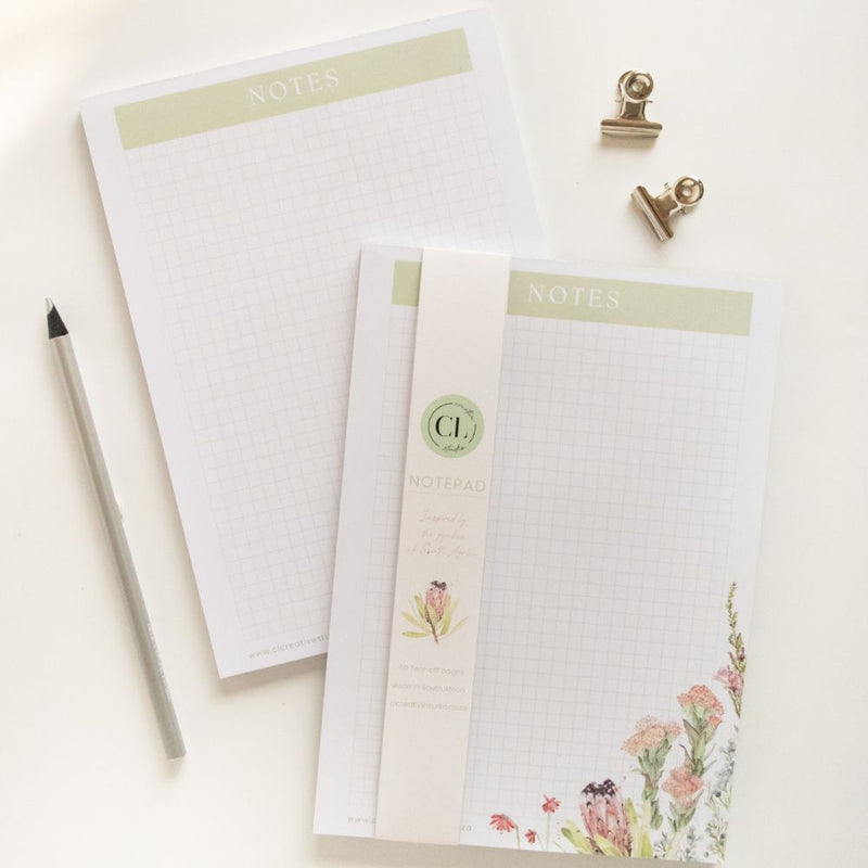 Elevate your note-taking experience with our Fynbos A5 Notepad, featuring exquisite watercolor fynbos artwork by Claudi Lourens.
