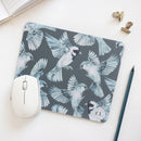 Experience the seamless blend of functionality and artistry with the Indigo Birds, Fynbos and Lilac-breasted Roller Mousepad, featuring birds in flight painted with indigo watercolour.