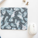 Experience the seamless blend of functionality and artistry with the Indigo Birds, Fynbos and Lilac-breasted Roller Mousepad, featuring birds in flight painted with indigo watercolour.