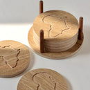 This set of coasters comes in a set of 6 and a holder, the holder also has an outline of Africa engraved on it.