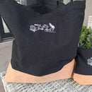 Sleek, sturdy, and eco-chic – our Black & Cork Shopper Bag is made for the modern explorer. The deep black fabric brings timeless style, while the natural cork base adds an earthy edge and extra durability. Spacious enough for market strolls, beach essentials, or daily must-haves, it’s as practical as it is eye-catching. Lightweight, comfortable to carry, and made to stand out – this shopper bag is your perfect companion, whether you're heading out or checking in.