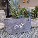 Sustainably made and built for the road, the EXPLR Recycled Grey Make-Up bag is your trusty sidekick for holidays and everything in between. Made from durable recycled materials, it’s lightweight, foldable, and kind to the planet—without skimping on style.