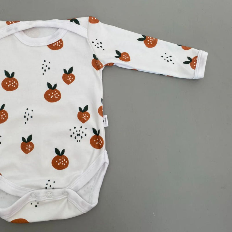 Long Sleeve onesie with envelope neck
Snaps at crotch to assist with easy diaper changes.
100% Cotton Interlock

Design - Apricot