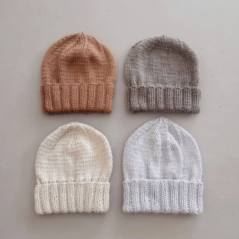 Cute, knitted Rib Beanie.
100% Cotton wool.
Colors: Brick, Chocolate, Ice Grey, Stone, Black, Charcoal