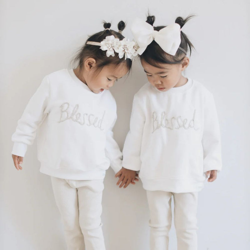 WE ARE BLESSED!!

Our Comfortable Sweaters made out of Cotton Brushed Fleece for the windy or cooler weather.

(Warm Fleece Cuddly feel on the inside of our Fabric).

Colour - Cream & Stone Hand Embroidery Detail