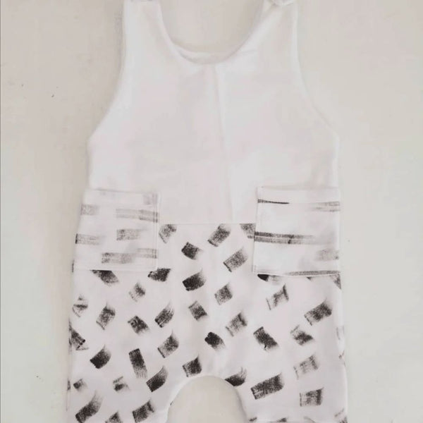 Stylish and comfortable romper with press studs on shoulders.
100% Cotton Interlock