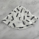 Stretch Denim with fringe detail.

White sun hat with Black Brushstroke design.

Its giving Monochrome vibes.