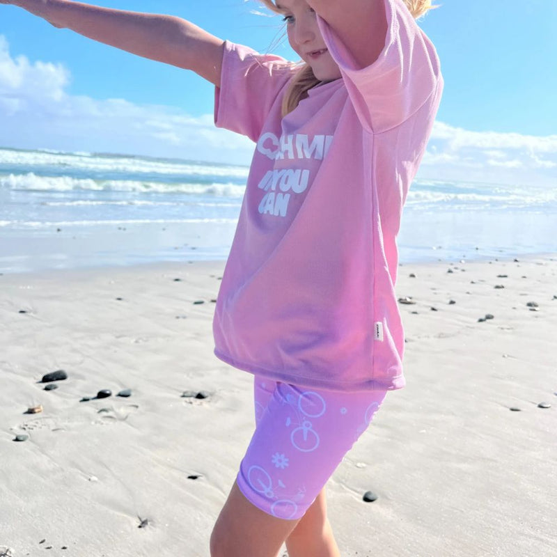 Playful, energetic, and full of charm! Our Catch Me Set features a comfy pair of floral bicycle print tights and a matching top with the bold slogan “Catch me if you can.”