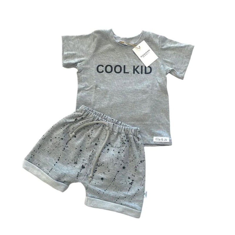 Cool, light and perfect for spring, summer and play time!

Made in 100% Cotton fabric.

Single printed cool kid T-shirt | Unbrushed Fleece Shorts with splatter ink print and string detail. 

