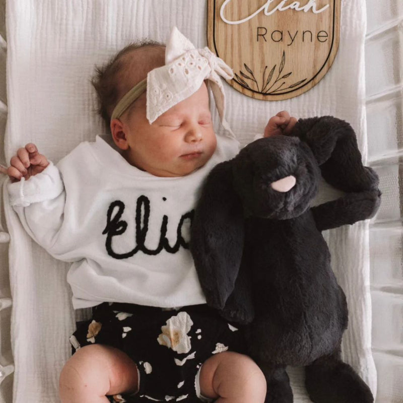 Our Custom sweaters are not just adorable; they are personalized with your baby's name, adding a touch of individuality and making it a truly special keepsake item. It's the perfect gift for baby showers or birthdays, offering a delightful surprise for both parents and little ones.