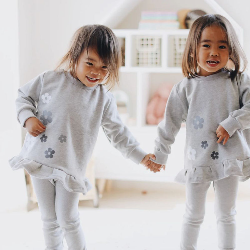 Our Comfortable Swing dresses made out of Cotton Brushed Fleece for the windy or cooler weather.

Plain Grey with Different Shades of Grey Printed Flowers 