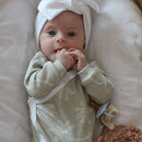 Long Sleeve onesie with envelope neck
Snaps at crotch to assist with easy diaper changes.
100% Cotton Interlock