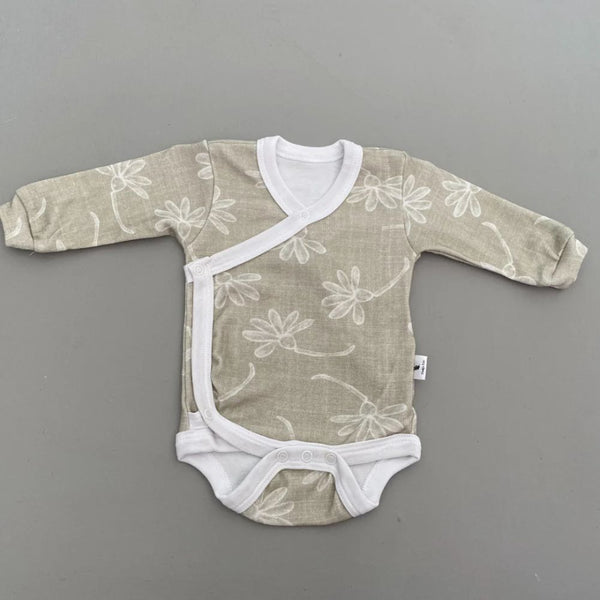 Long Sleeve onesie with envelope neck
Snaps at crotch to assist with easy diaper changes.
100% Cotton Interlock