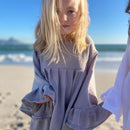 Soft Double Layered 100% Cotton Muslin is used for this Gorgeous Gypsy dress with sleeve detail.

-Round neck

-Snap clips at back for fastening

-Three quarter length sleeves with frill detail.

-Cotton Muslin

AS SEEN IN BRITISH VOGUE

