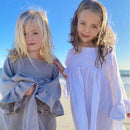 Soft Double Layered 100% Cotton Muslin is used for this Gorgeous Gypsy dress with sleeve detail.

-Round neck

-Snap clips at back for fastening

-Three quarter length sleeves with frill detail.

-Cotton Muslin

AS SEEN IN BRITISH VOGUE

