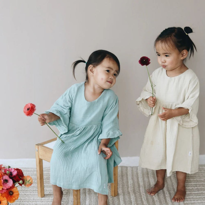 Soft Double Layered 100% Cotton Muslin is used for this Gorgeous Gypsy dress with sleeve detail.

-Round neck

-Snap clips at back for fastening

-Three quarter length sleeves with frill detail.

-Cotton Muslin