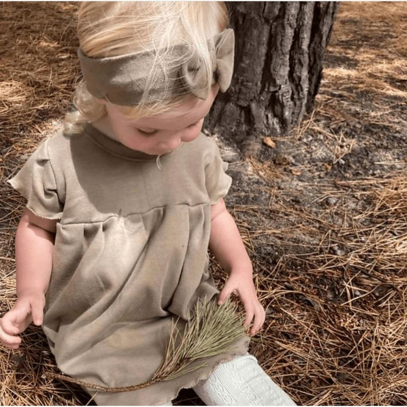 The Isla Short frill Sleeve Dress is a must-have addition to their warm weather wardrobe.
A comfy, relaxed fit with a twirl-worthy silhouette.
Includes 1 x Knotted headband
100% Cotton