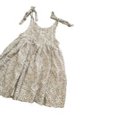 A Bit of Monochrome to style the occassion.
Designed for the little sassy one. 
Knots on shoulders to adjust. 

Cotton - Dot Print