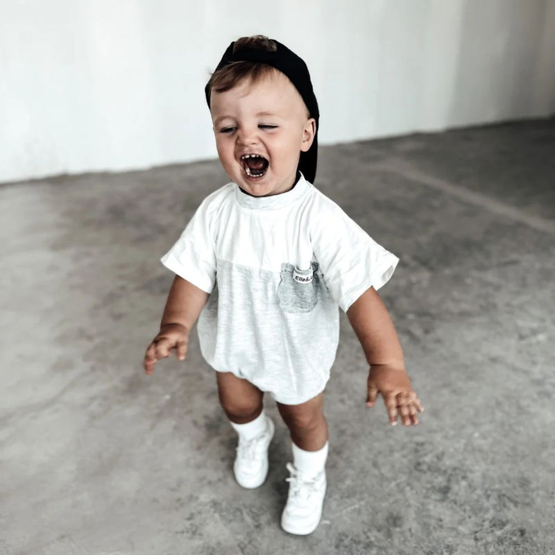 Our Oversized two-toned Knox romper is the stylish romper for boys.

It has Snap clips at crotch for easy nappy changing.

Made in Beautiful 100% Cotton Lightweight fabric. 

Rib Pocket detail for a trendy look.