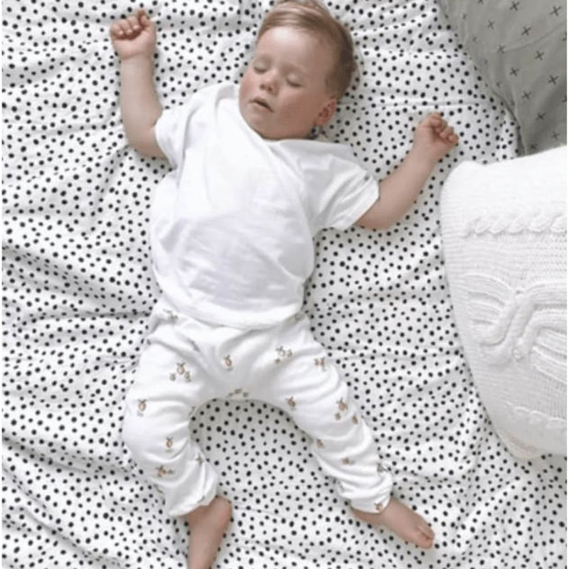 Designed with love and care, these locally handmade joggers are the epitome of quality clothing for your precious bundle of joy. Crafted with soft, breathable fabrics, Ella & Jo Baby Joggers provide ultimate comfort for your little explorer. Whether they're crawling, playing, or even taking their very first steps, these joggers will keep them cozy and happy all day long. 