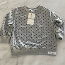 Our Comfortable Lightning Bolt Sweater made out of 100% Cotton Interlock for the windy or cooler weather.

Colour - Grey Mélange with Lightning Bolt Maroon Print

This Sweater Pairs super cool with our Raw Detailed Jogger - Grey Mélange

