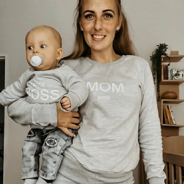 The Mom Boss and Little Boss Crew Neck, the ultimate matching outfit for stylish moms and their little ones. Designed with love and locally handmade, this cozy and comfortable sweater is the essential clothing item for all the mom bosses out there!