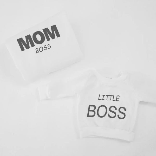 The Mom Boss and Little Boss Crew Neck, the ultimate matching outfit for stylish moms and their little ones. Designed with love and locally handmade, this cozy and comfortable sweater is the essential clothing item for all the mom bosses out there!